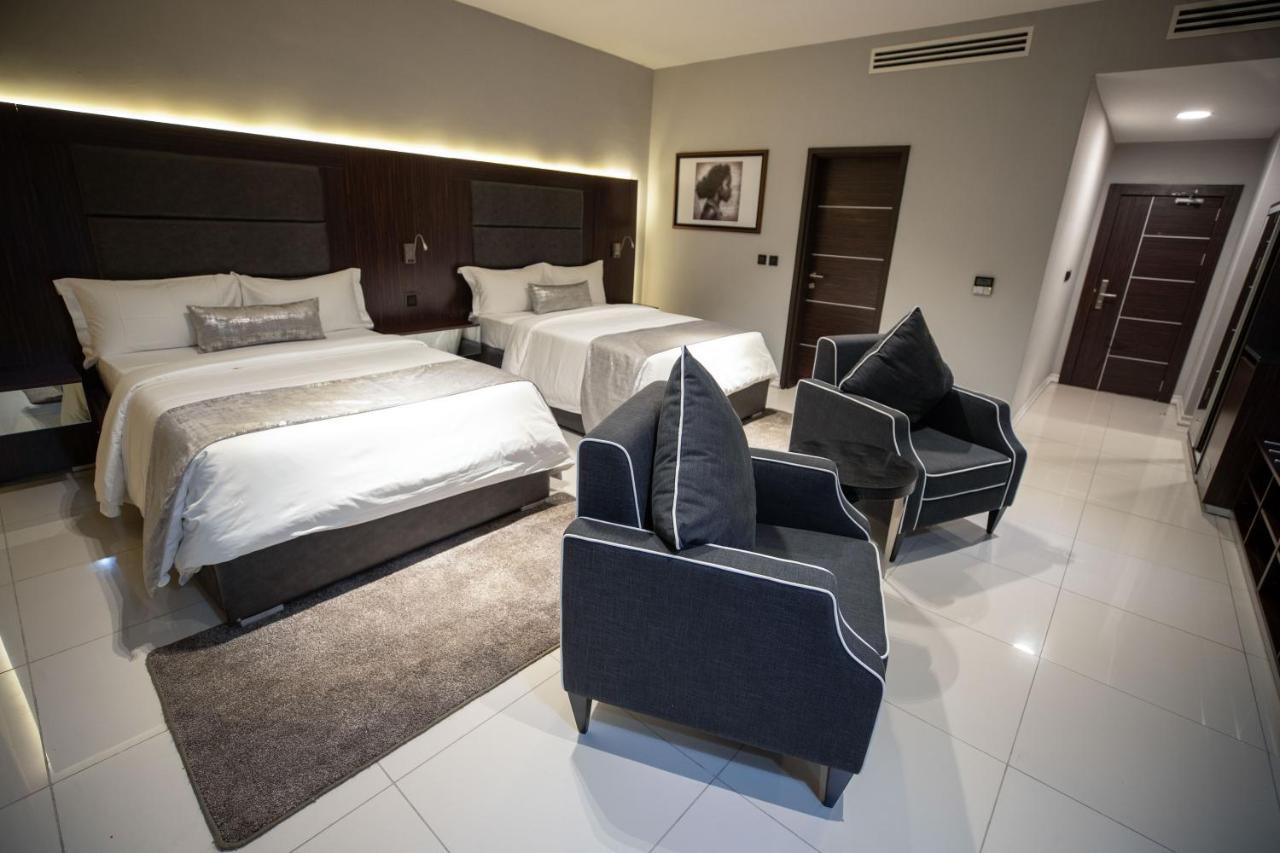 Bon Hotel Tripod Оуери Екстериор снимка